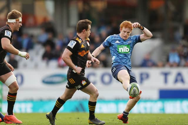 Finlay Christie of the Blues puts in a kick during the Super Rugby Aotearoa match against the Chiefs at Eden Park. Picture: Anthony Au-Yeung/Getty Images
