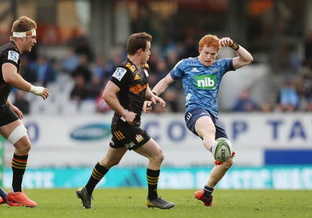Finlay Christie of the Blues puts in a kick during the Super Rugby Aotearoa match against the Chiefs at Eden Park. Picture: Anthony Au-Yeung/Getty Images