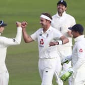 Stuart Broad, centre, celebrates with his England team-mates after dismissing West Indies' John Campbell during the third day of the third Test at Old Trafford. Picture: Michael Steele/Pool via AP