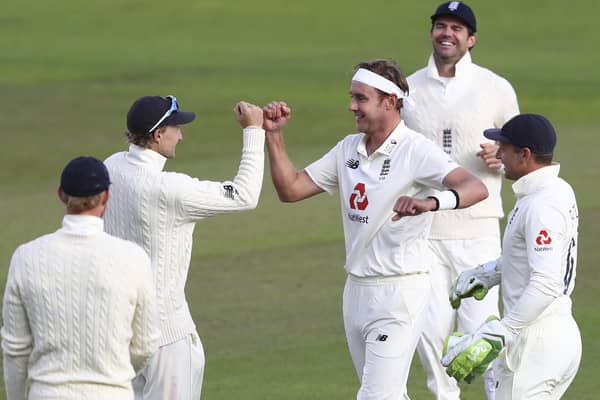 Stuart Broad, centre, celebrates with his England team-mates after dismissing West Indies' John Campbell during the third day of the third Test at Old Trafford. Picture: Michael Steele/Pool via AP