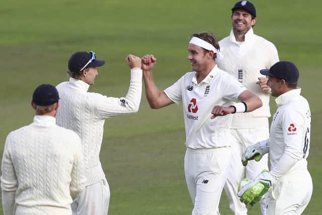 Stuart Broad, centre, celebrates with his England team-mates after dismissing West Indies' John Campbell during the third day of the third Test at Old Trafford. Picture: Michael Steele/Pool via AP