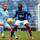 Coventry City's Liam Kelly, left, and Rangers' Glen Kamara battle for the ball during the pre-season friendly at Ibrox on Saturday. Picture: Jane Barlow/PA Wire