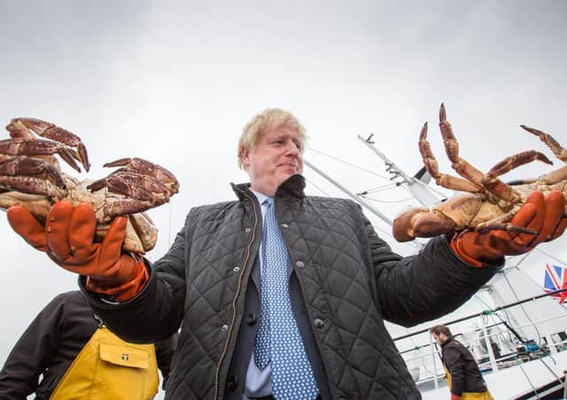 Boris Johnson on a visit to Stromness harbour in Orkney