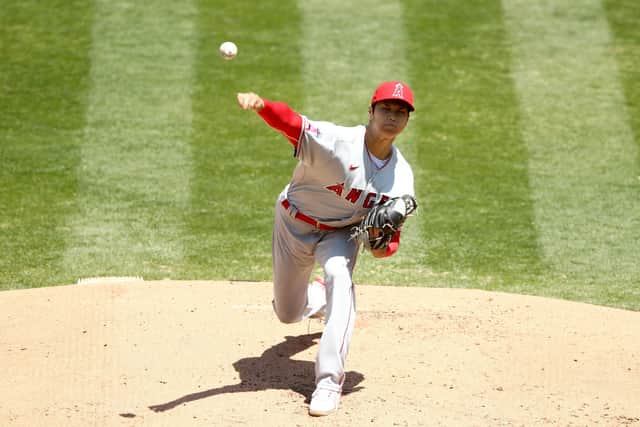 Shohei Ohtani of the Los Angeles Angels pitches against the Oakland Athletics on Sunday. He has a rare skillset of being able to both pitch and bat to a very high standard. Picture: Ezra Shaw/Getty Images