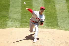 Shohei Ohtani of the Los Angeles Angels pitches against the Oakland Athletics on Sunday. He has a rare skillset of being able to both pitch and bat to a very high standard. Picture: Ezra Shaw/Getty Images