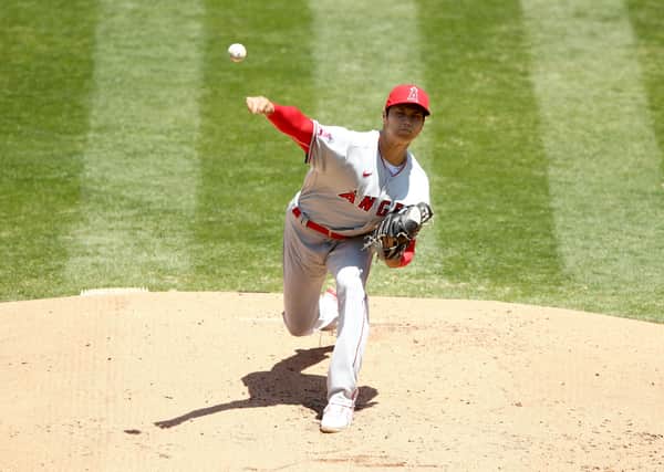 Shohei Ohtani of the Los Angeles Angels pitches against the Oakland Athletics on Sunday. He has a rare skillset of being able to both pitch and bat to a very high standard. Picture: Ezra Shaw/Getty Images