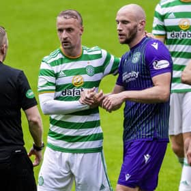 Leigh Griffiths shakes hands with David Gray following Celtic's 3-1 friendly win over Hibs at Parkhead. Picture: SNS