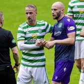 Leigh Griffiths shakes hands with David Gray following Celtic's 3-1 friendly win over Hibs at Parkhead. Picture: SNS