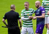 Leigh Griffiths shakes hands with David Gray following Celtic's 3-1 friendly win over Hibs at Parkhead. Picture: SNS