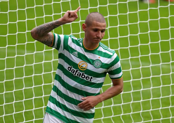 Celtic's Patryk Klimala celebrates scoring his side's third goal against Hibs in the pre-season friendly at Celtic Park. Picture: Andrew Milligan/PA Wire.