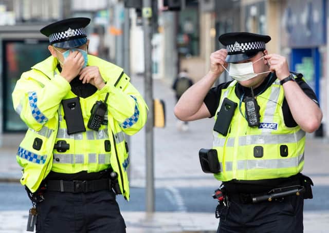 Police officers are the people who will have to enforce the provisions of the new Hate Crime Bill (Picture: Lesley Martin/AFP via Getty Images)