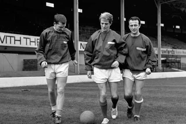 Joe McBride, Willie Hunter  and Pat Quinn at Hibs’ Easter Road Stadium during a training session in November 1968