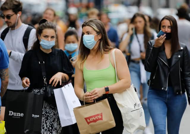 Shoppers wear face masks on Oxford Street om London. Picture: Getty