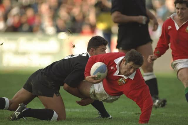 Tour captain Gavin Hastings, who scored the winning try in British Lions’ 24-20 victory against New Zealand Maoris, touches down during the 1993 match in Wellington. Picture: Getty