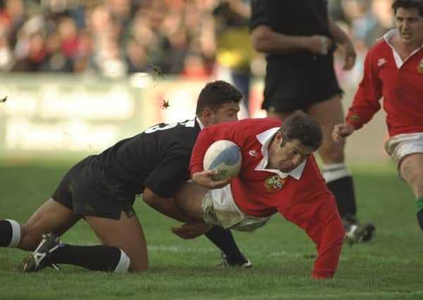 Tour captain Gavin Hastings, who scored the winning try in British Lions’ 24-20 victory against New Zealand Maoris, touches down during the 1993 match in Wellington. Picture: Getty