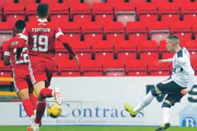 Rangers' Ryan Kent sweeps home the only goal of the game at Pittodrie. Picture: Andrew Milligan/Getty Images