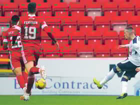 Rangers' Ryan Kent sweeps home the only goal of the game at Pittodrie. Picture: Andrew Milligan/Getty Images