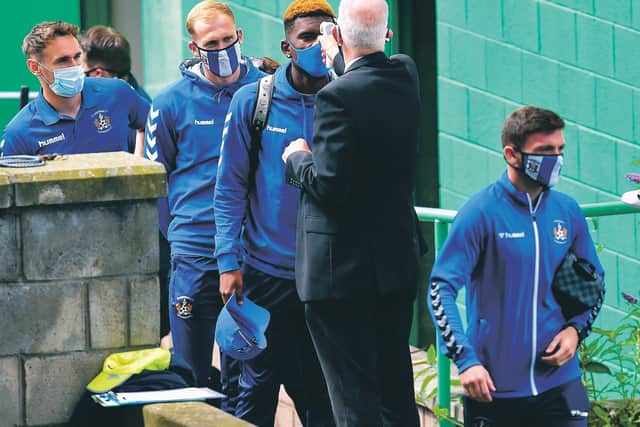 Kilmarnock players arrive for yesterday's game at Easter Road. Picture: Rob Casey/SNS