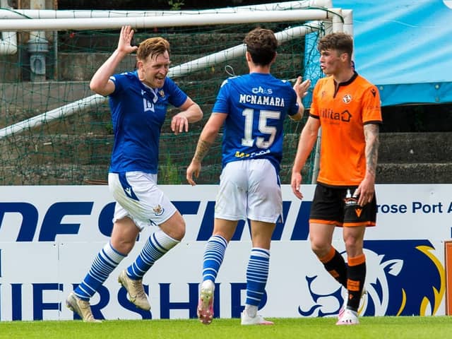 Liam Craig celebrates after his spectacular equaliser, which came after Michael O’Halloran’s red card. Picture: SNS.