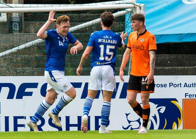 Liam Craig celebrates after his spectacular equaliser, which came after Michael O’Halloran’s red card. Picture: SNS.