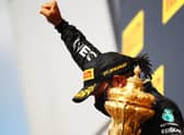 Lewis Hamilton celebrates with a black power salute after winning his seventh British Grand Prix. Picture: Bryn Lennon/Getty Images