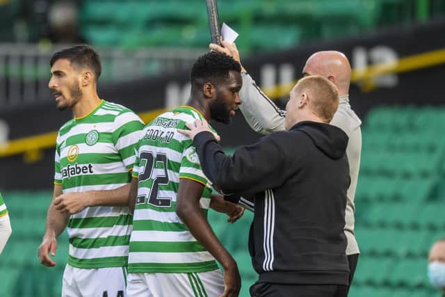 Edouard is greeted by Neil Lennon after being subbed. Picture: SNS.
