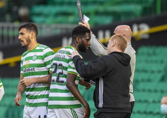 Edouard is greeted by Neil Lennon after being subbed. Picture: SNS.