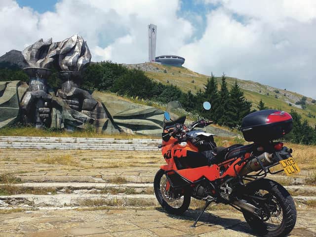 Buzludzha, the abandoned communist headquarters in the shape of a flying saucer and nearby monument. Photograph: Graham Field
