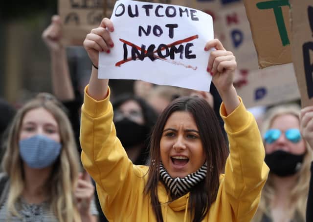 Pupils in Glasgow’s George Square protest against the downgrading of exam results by the SQA. Picture: Andrew Milligan/PA Wire