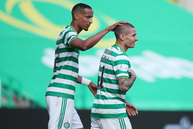 Christopher Jullien gives Patryk Klimala a pat on the head after the striker scored for Celtic against Hamilton. Picture: Ian MacNicol/Getty Images