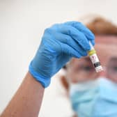 A sample is checked at a Covid-19 testing centre. A nasal spray could be the new medicine in the fight against coronavirus. Picture: John Devlin