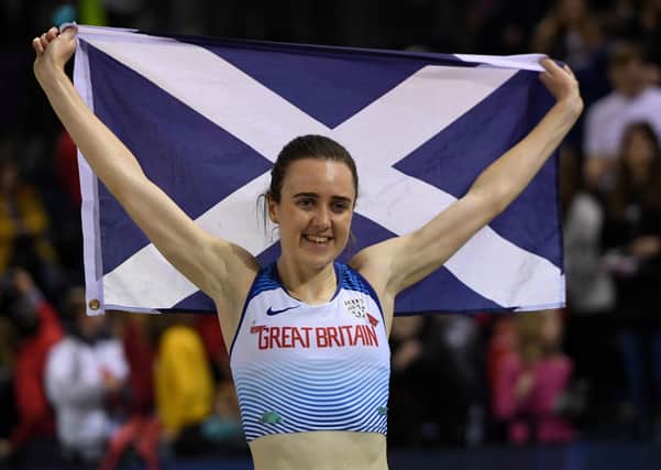 Laura Muir, posing with a Saltire after winning the 1,000m at the Muller Indoor Grand Prix in Glasgow in February, has gained from training alongside Jemma Reekie during lockdown. Picture: AFP/Getty
