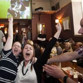 Pubs have rallied fans back to the cause, but Iain McMenemy argues that football clubs offer more to the community than the pubs. Picture: SNS.
