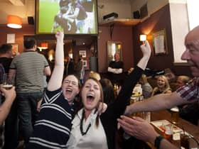 Pubs have rallied fans back to the cause, but Iain McMenemy argues that football clubs offer more to the community than the pubs. Picture: SNS.