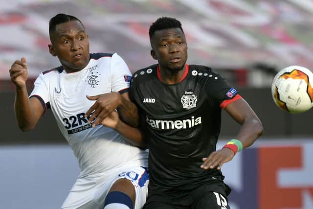 Alfredo Morelos vies with Edmond Tapsoba during Rangers' defeat by Bayer Leverkusen at the Bay Arena. Picture: Sascha Schuermann/Pool via Getty Images