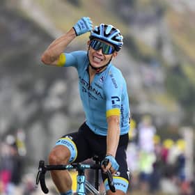 Colombia's Miguel Angel Lopez celebrates as he crosses the finish line to win stage 17 of the Tour de France from Grenoble to Col de la Loze. Picture: Stuart Franklin/Pool via AP
