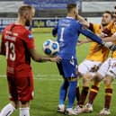 Stephen O'Donnell and Declan Gallagher rush to congratulate Trevor Carson after the keeper's penalty shootout heroics for Motherwell. Picture: Brian Lawless/PA Wire