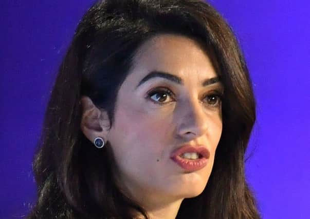 Amal Clooney has resigned as a UK special envoy. Picture:  Dominic Lipinski/PA Wire