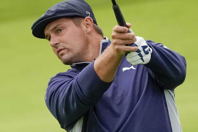 Bryson DeChambeau plays a shot at the 12th. Picture: Charles Krupa/AP