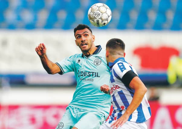 Vangelis Pavlidis of Willem II challenges with Ibrahim Dresevic of SC Heerenveen during the Dutch Eredivisie match on 12 Sep 2020. Photo by Hollandse Hoogte/Shutterstock