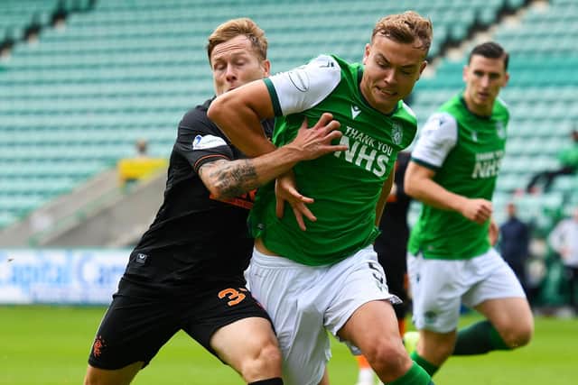 Ryan Porteous battles with Rangers’ Scott Arfield during Sunday’s 2-2 draw at Easter Road. Picture: SNS.