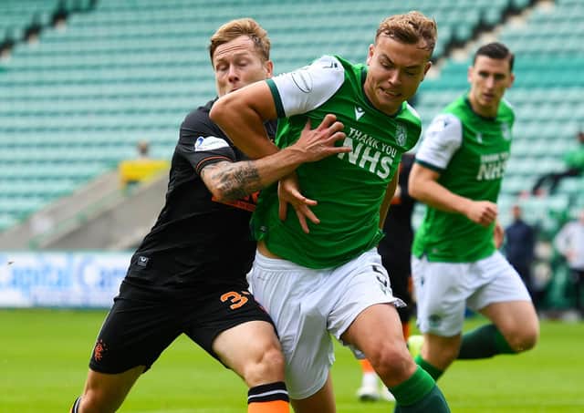 Ryan Porteous battles with Rangers’ Scott Arfield during Sunday’s 2-2 draw at Easter Road. Picture: SNS.