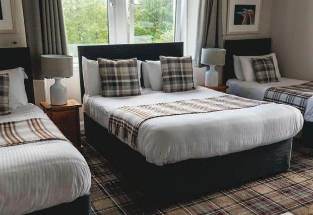 Tartan carpets and throws make this family room homely and comfortable. Even rooms facing the main road through the village enjoy sheer silence during the night.