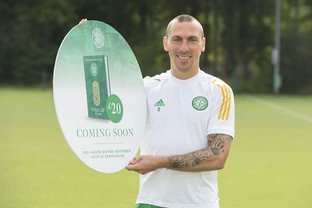 Celtic captain Scott Brown promotes the club's forthcoming book about nine in a row. Picture: Craig Foy/SNS