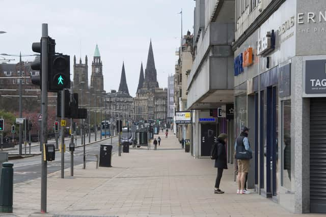 A nearly deserted Princes Street at midday during lockdown