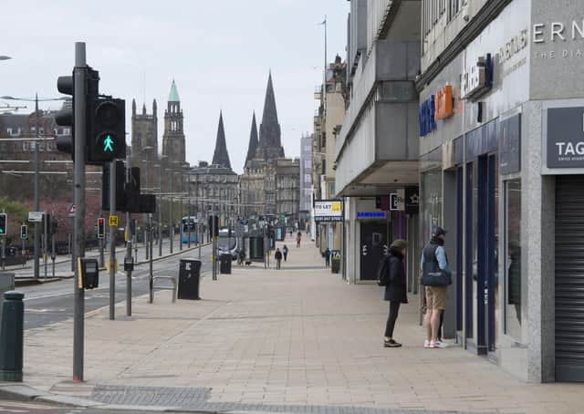 A nearly deserted Princes Street at midday during lockdown