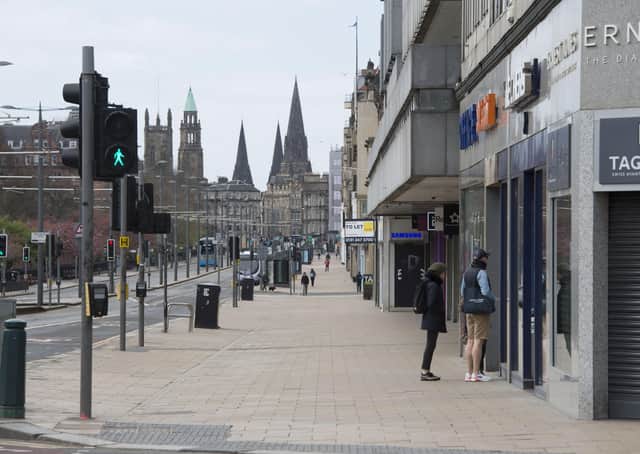 A nearly deserted Princes Street at midday during lockdown