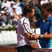 Andy Murray, left, congratulates Stan Wawrinka on his victory in the 2017 French Open semi-final. Picture: Julian Finney/Getty