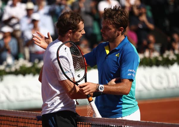 Andy Murray, left, congratulates Stan Wawrinka on his victory in the 2017 French Open semi-final. Picture: Julian Finney/Getty