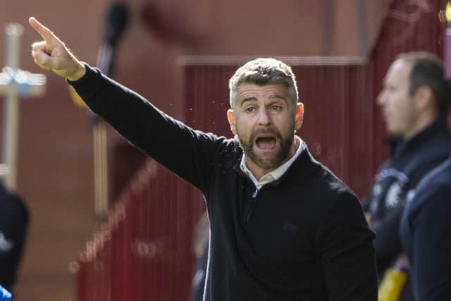 Stephen Robinson refused to blame the penalty decisions for his side's defeat. Picture: SNS.